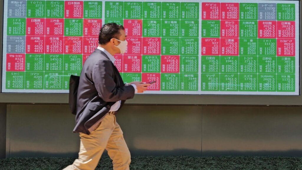 Japan’s Nikkei Retreats from 63,000 Milestone Amid Tech Slump and Geopolitical Tensions